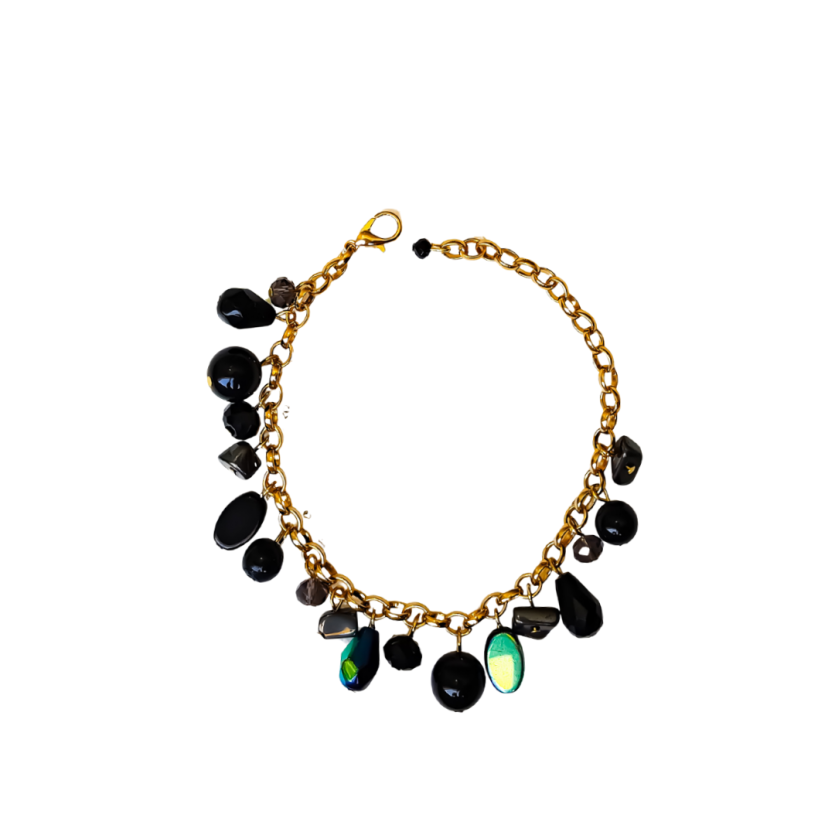 Pulseira preta com corrente dourada e pedrarias múltiplas da Coleção Essência.